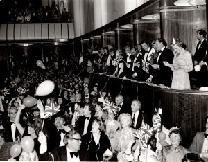 A black and white photograph of the Royal box and the audience