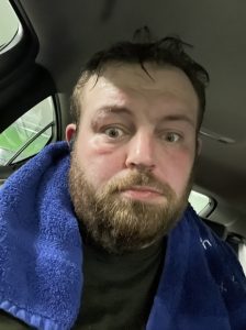 James Baker with a blue towel around his neck
