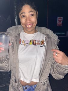 Dionne at the concert wearing her Spice Girls branded t-shirt