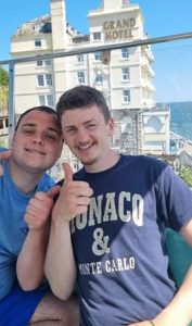 Aidan and Ben D giving a thumbs up to the camera