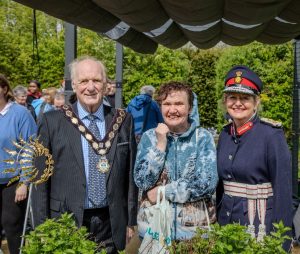 The Mayor of Shefford, Ken Pollard, HM Lord-Lieutenant of Bedfordshire, Susan Lousada, and one of the guests are all smiling at the camera.
